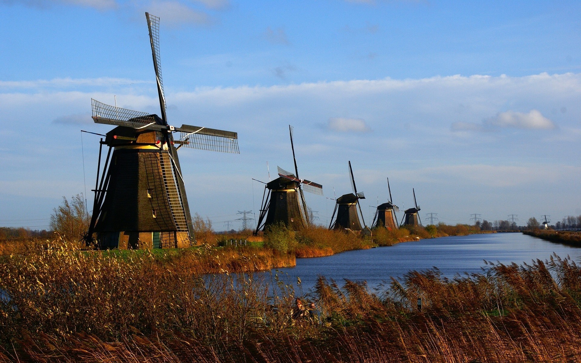 landscapes windmill grinder wind energy landscape farm agriculture sky outdoors countryside blade turbine water power travel grass windy technology environment