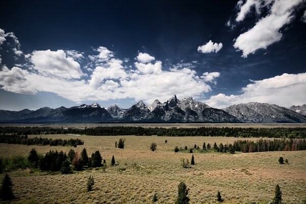 Clouds over mountain peaks