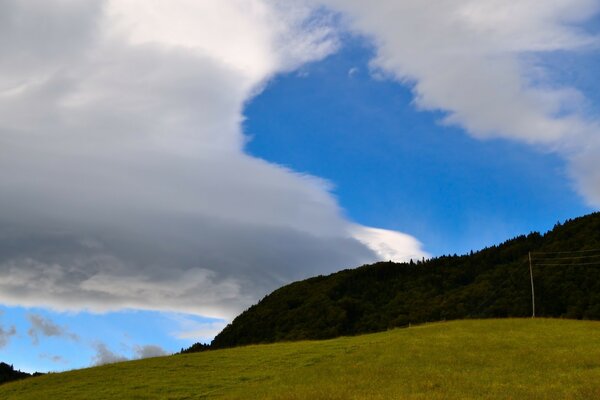 Cumulus clouds of hilly terrain