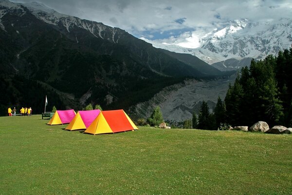 Mountain landscape with a tent camp