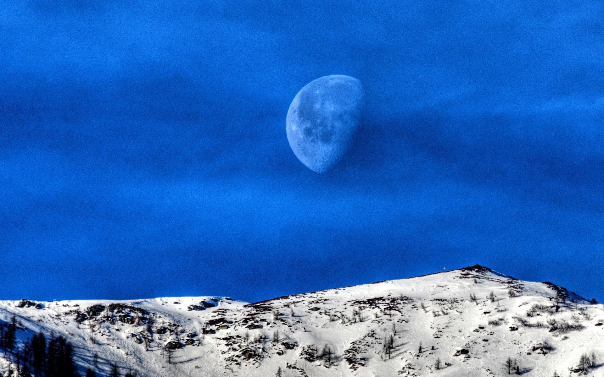 mountains snow sky outdoors nature ice winter travel moon cold landscape mountain daylight rock water fair weather weather exploration frozen light