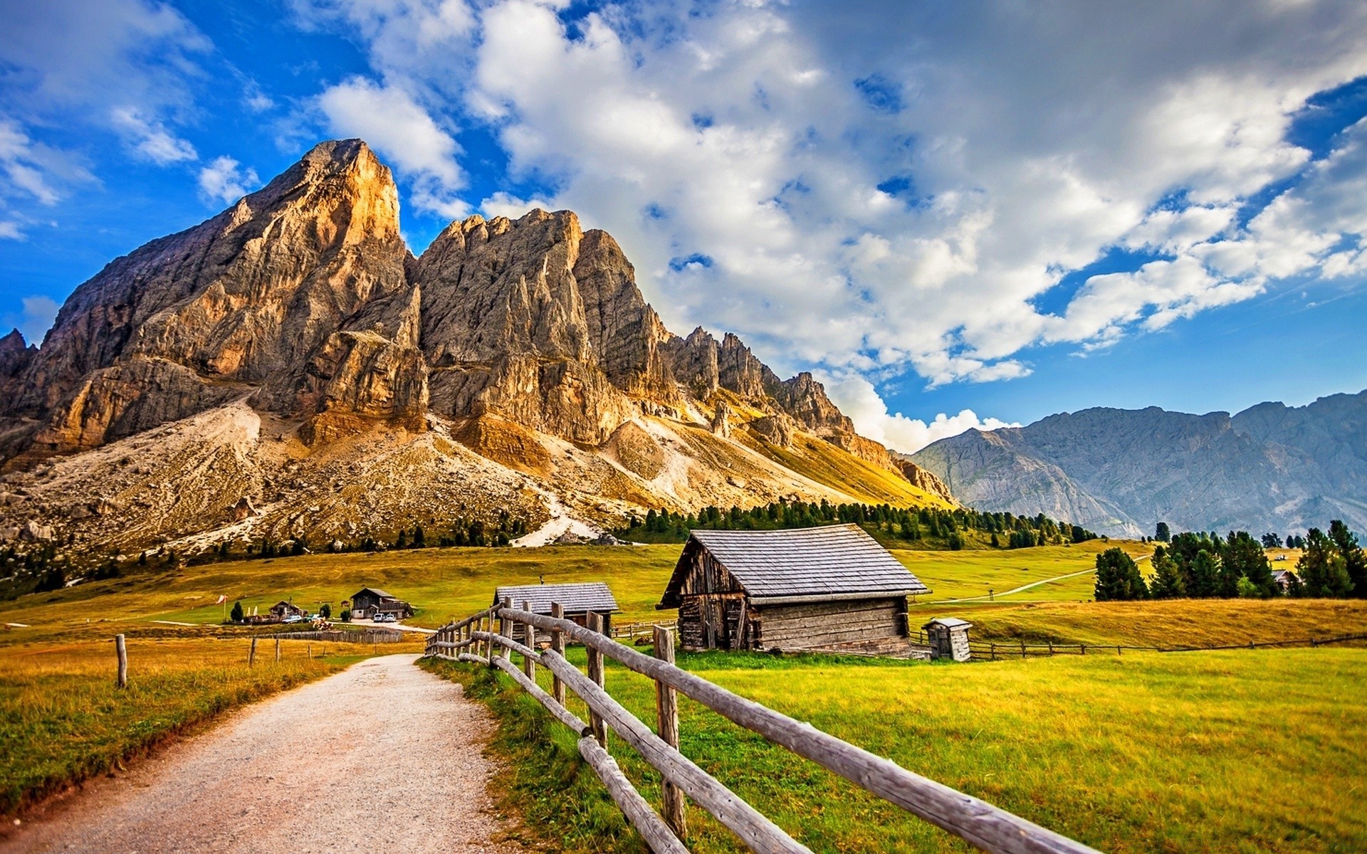 mountains mountain travel landscape sky nature outdoors valley scenic grass cloud wood hill rock summer rural hayfield