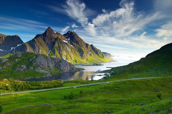 A landscape of mountains with a beautiful sky