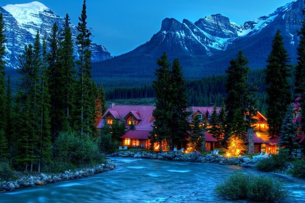 Fabulous wooden house near a mountain river