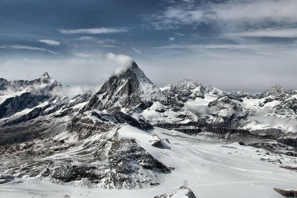 There is snow high in the mountains