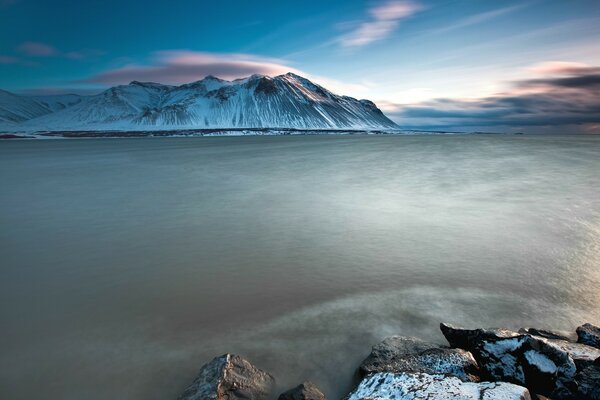 The blue sky reflects the beauty of the mountains