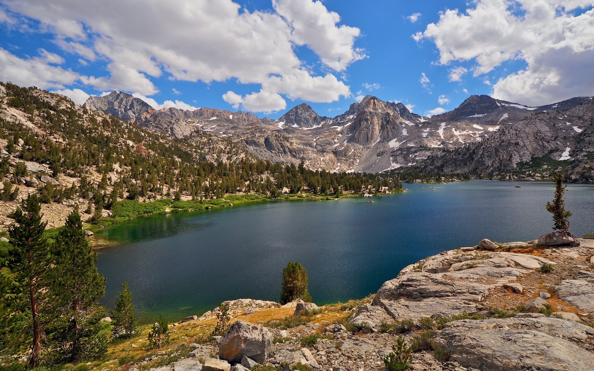 lake water mountain travel landscape outdoors nature sky scenic snow daylight valley reflection rock wood