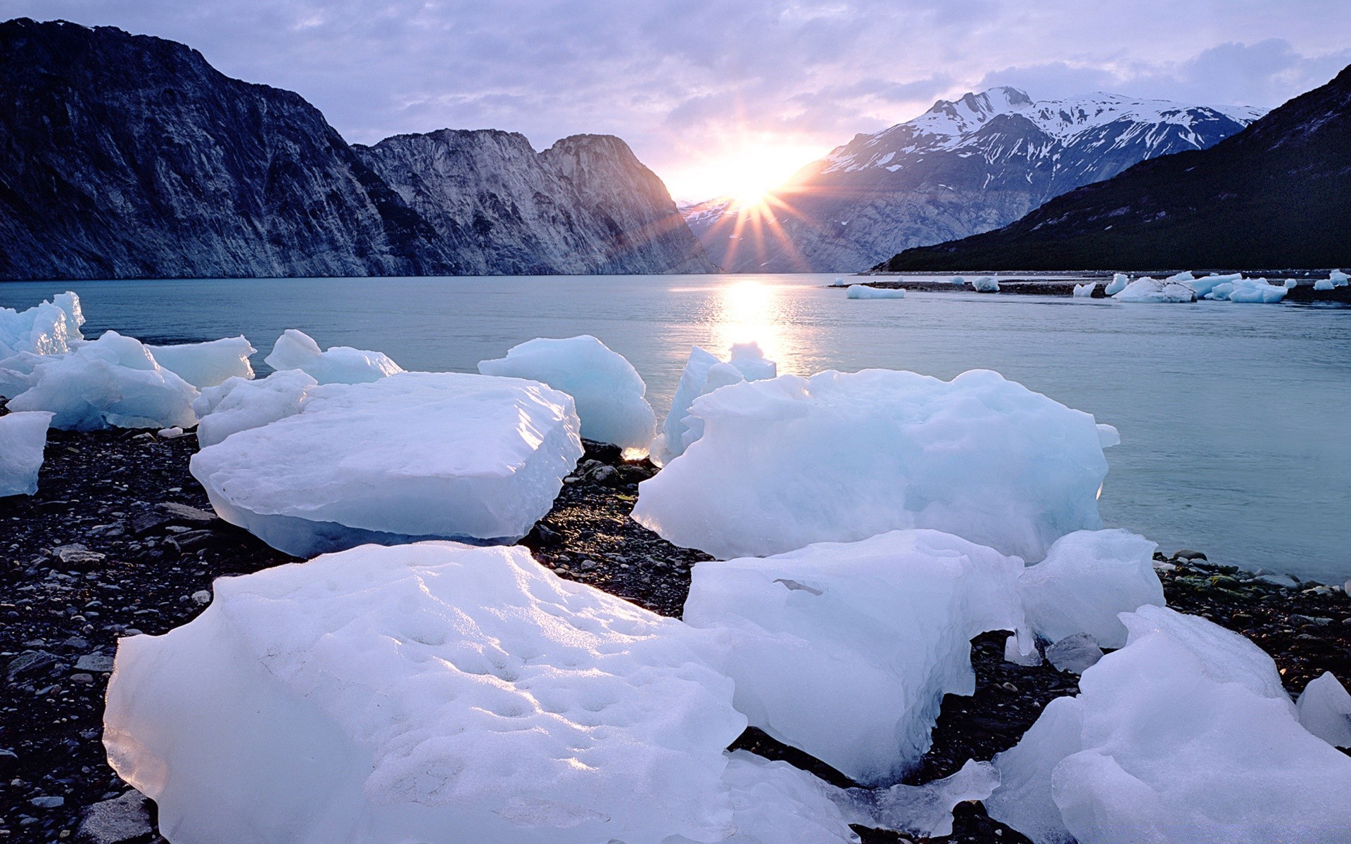 mountains snow iceberg ice water glacier winter frosty melting landscape mountain cold travel frozen sea climate change swimming rock outdoors lake