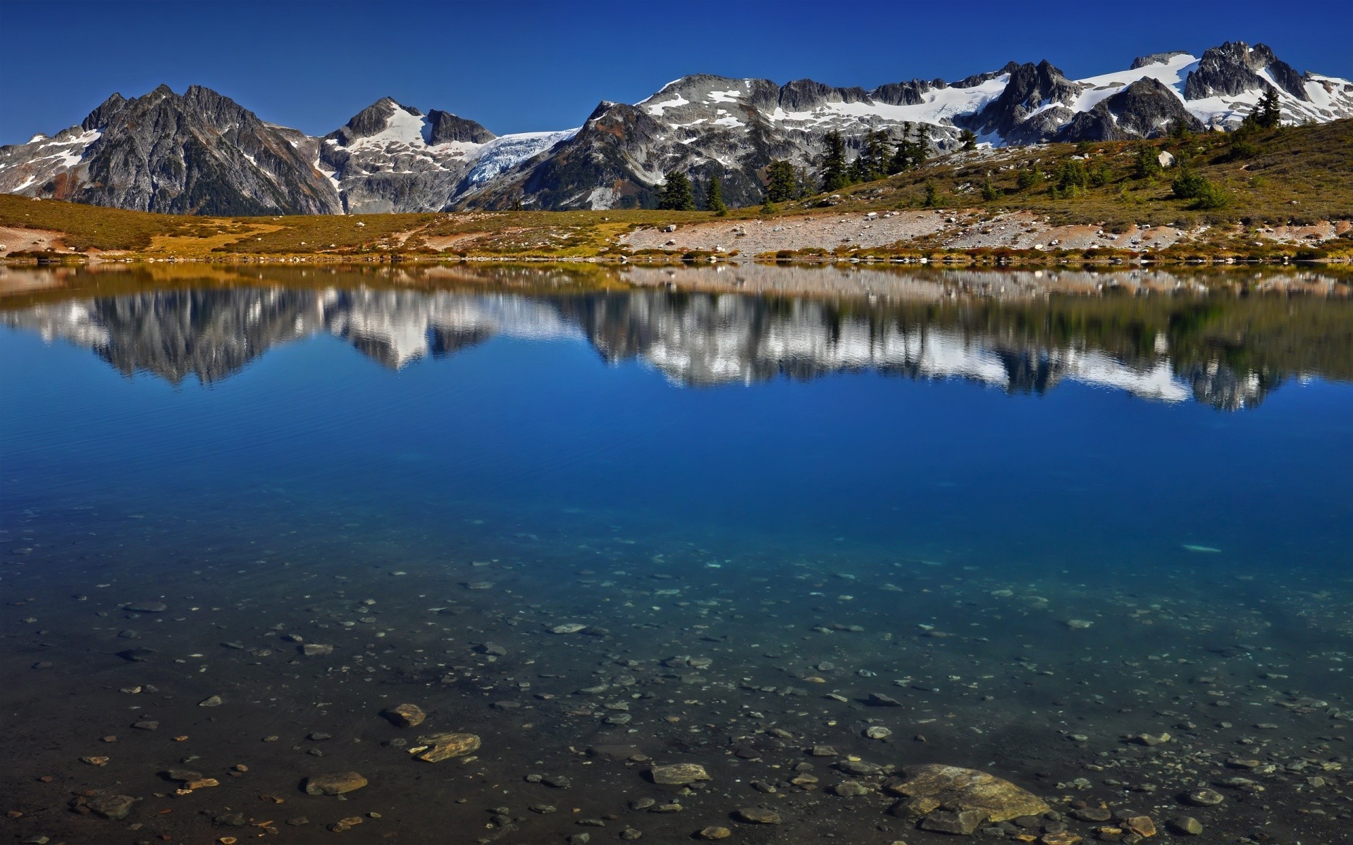 montagnes lac réflexion paysage eau montagnes voyage neige à l extérieur ciel scénique nature aube