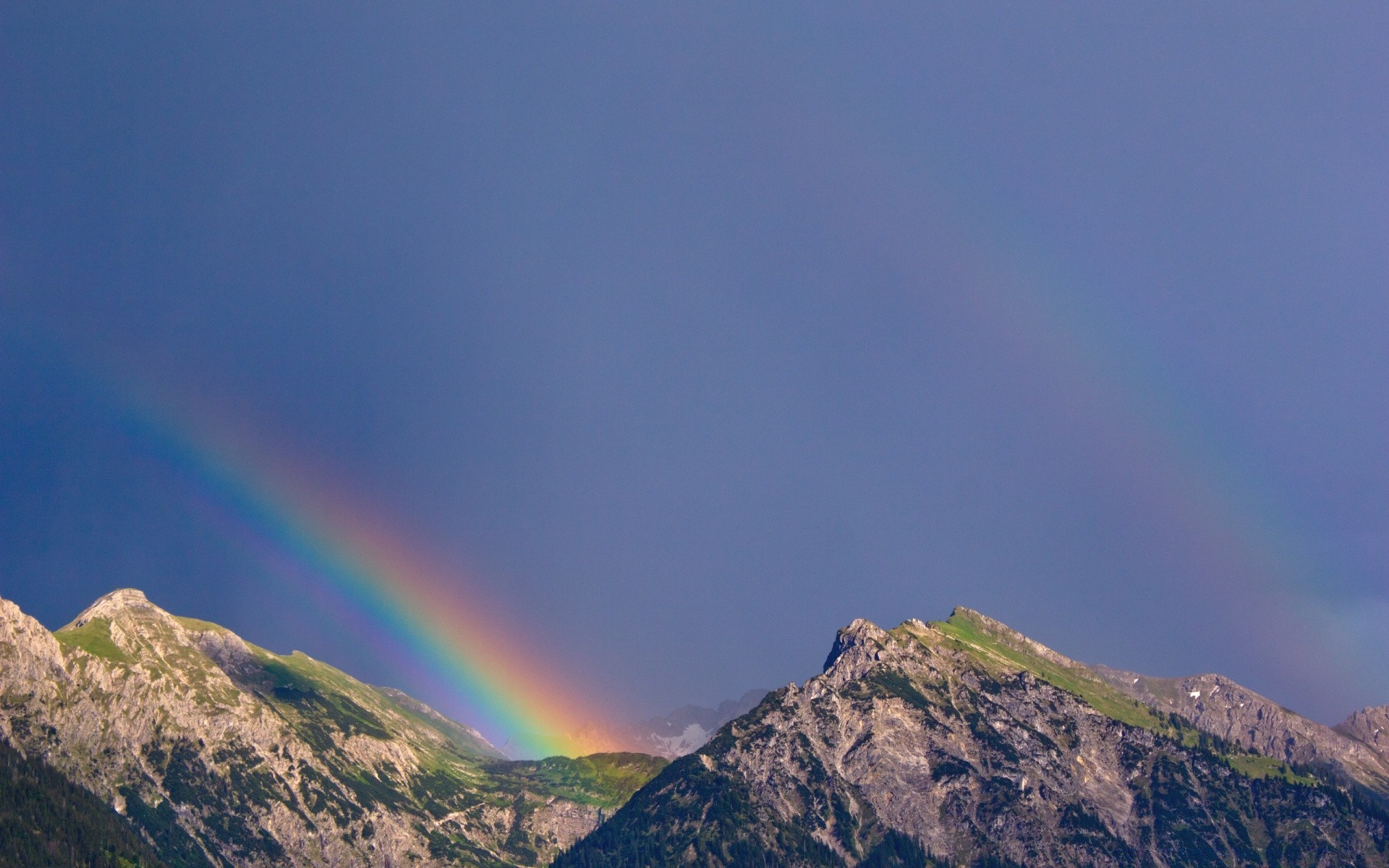 montañas paisaje montañas arco iris cielo viajes luz del día al aire libre roca puesta de sol naturaleza niebla escénico