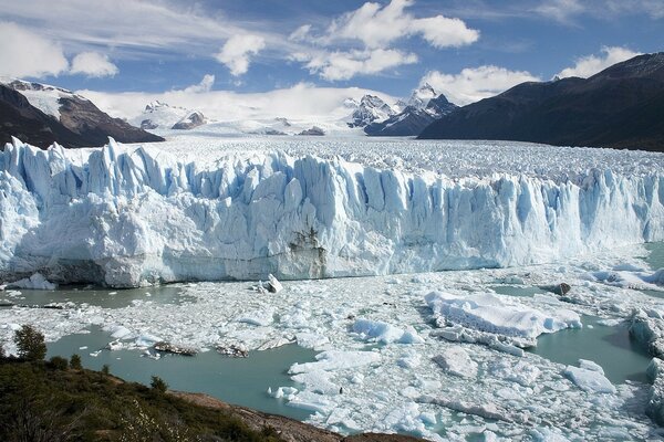 Melting of a huge glacier in the mountains