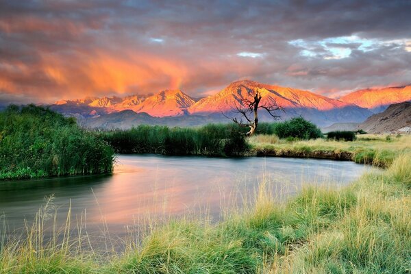 River on the background of the scarlet mountains