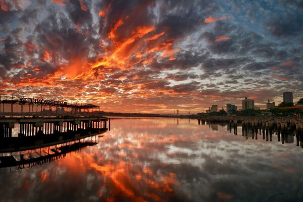 River pier in a crimson sunset