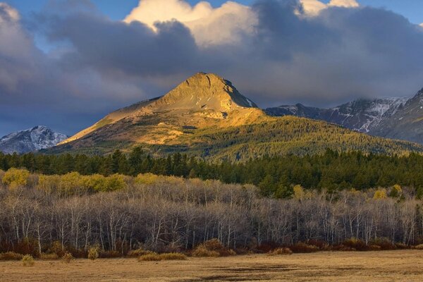 Autumn mountain landscape against a gloomy sky