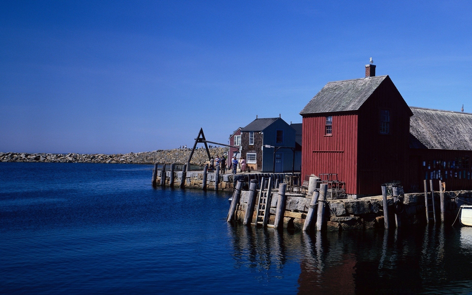 rivers ponds and streams water sea travel outdoors house seashore daylight pier bungalow architecture ocean reflection building sky beach