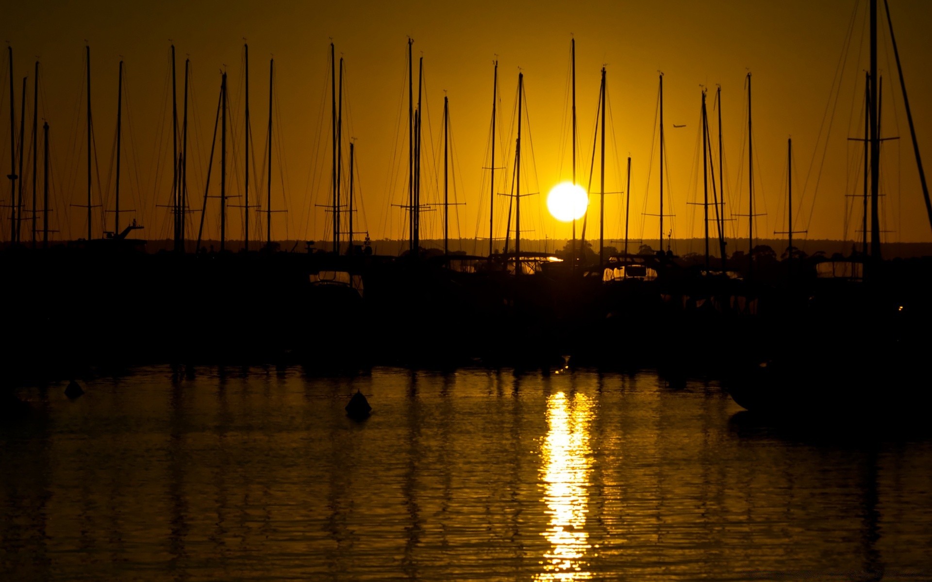 rivers ponds and streams sunset water dawn silhouette sky evening sea sun backlit reflection dusk boat pier light ocean energy lake travel landscape