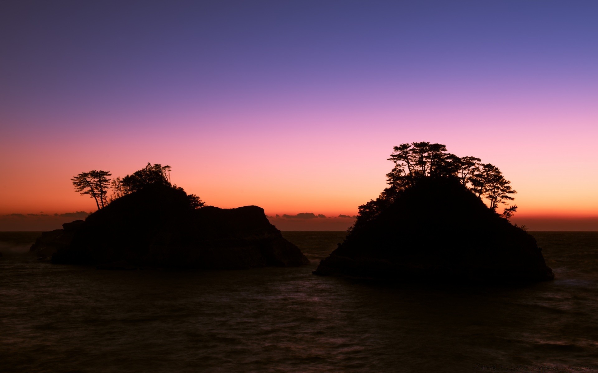 the sky sunset dawn evening dusk water landscape sea sun sky beach ocean travel silhouette seashore nature rock backlit light