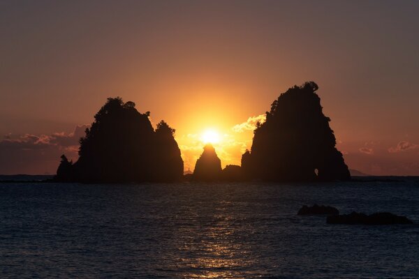 Sunset over an island in the sea