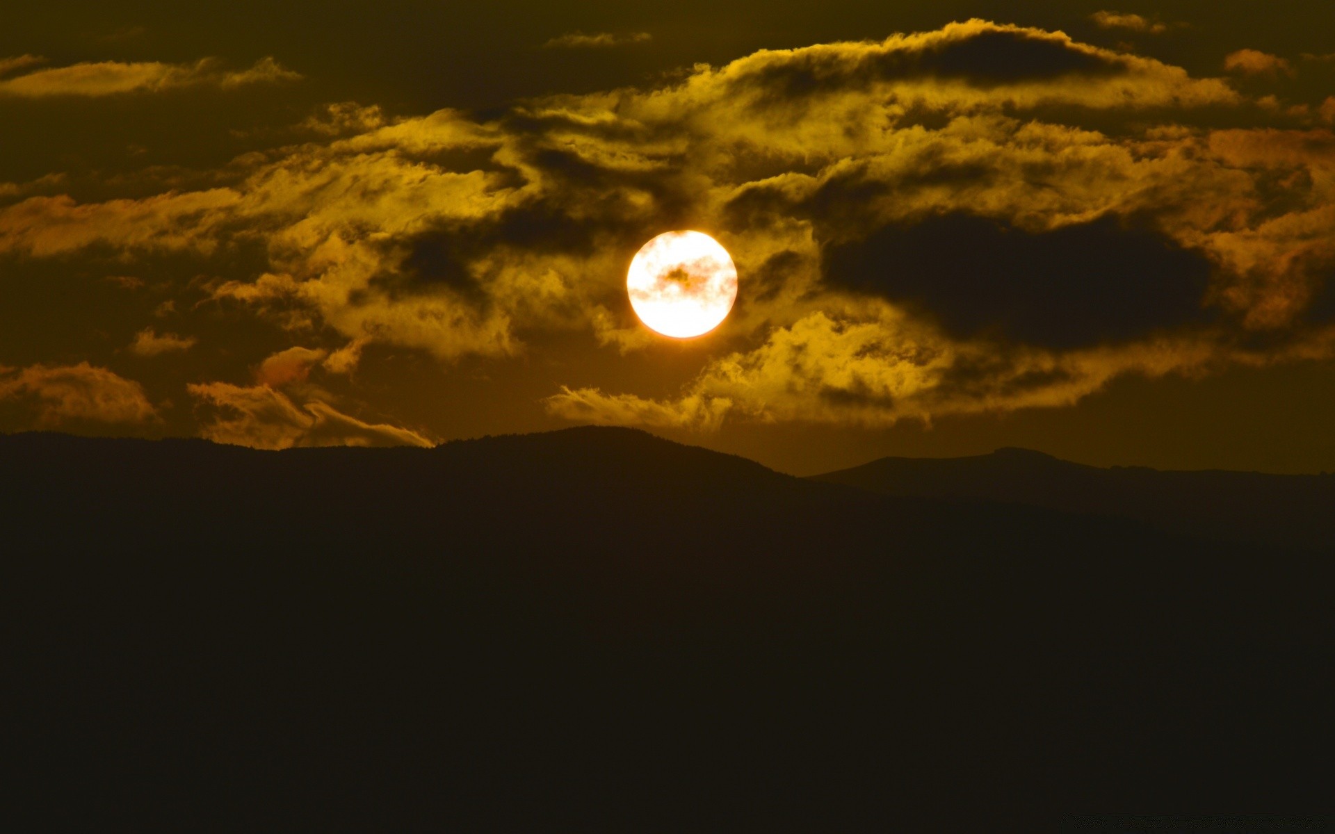 the sky sunset sky landscape dusk sun evening light moon dawn eclipse backlit silhouette cloud fair weather mountain nature weather shadow outdoors