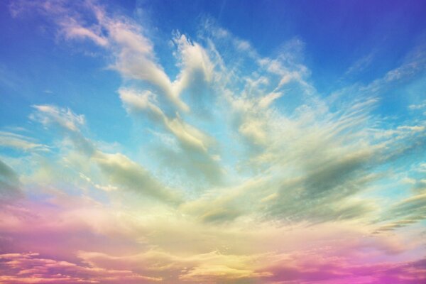 Summer sky. Colored clouds pastel colors