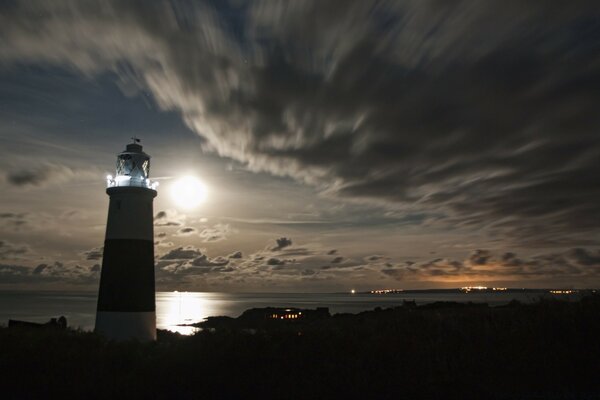 And only the lighthouse illuminates the way on the water