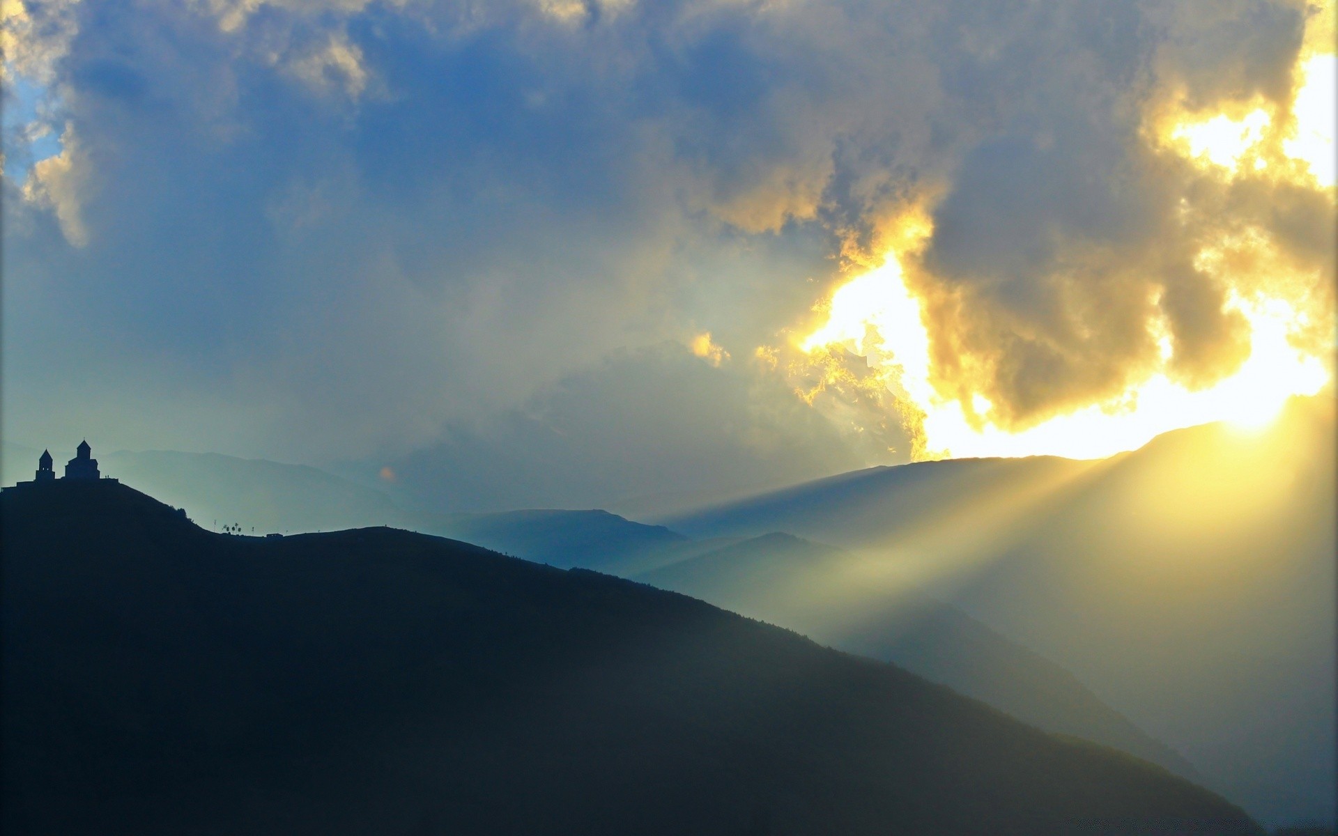 the sky sunset landscape dawn mountain sky sun evening travel fog light nature outdoors daylight fair weather