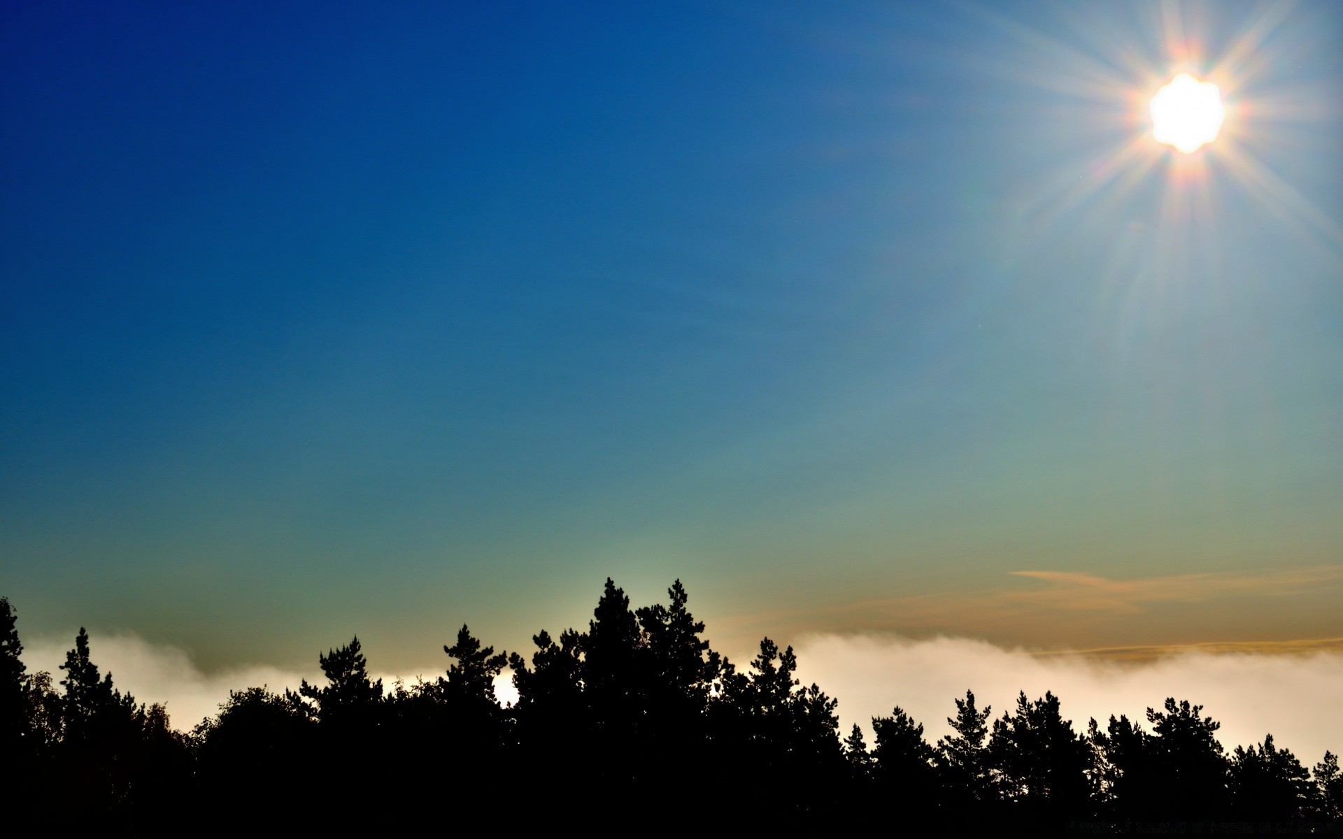 the sky sun sunset dawn moon sky fair weather evening nature outdoors dusk light silhouette fog landscape