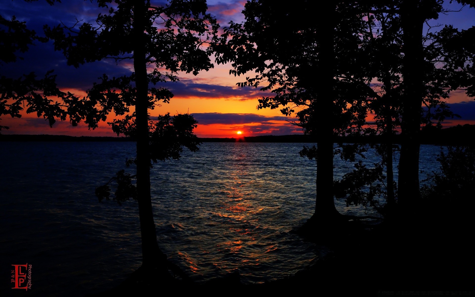 the sky water sunset dawn evening dusk lake reflection outdoors sun tree light landscape