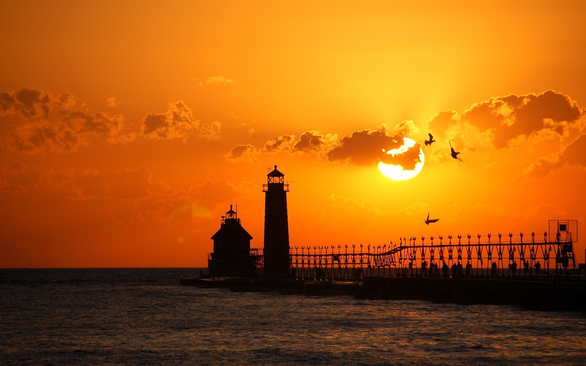 the sky sunset dawn water evening sea dusk ocean beach sun sky lighthouse backlit silhouette seashore light travel landscape seascape