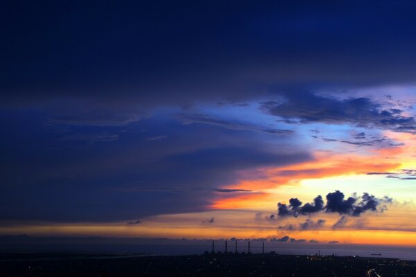 Dark blue sky and yellow sunset