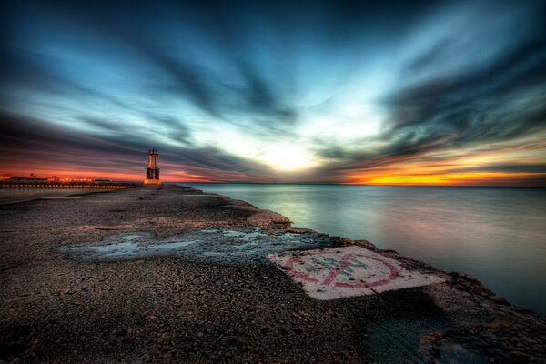 Puesta de sol dibujada en Photoshop y el río