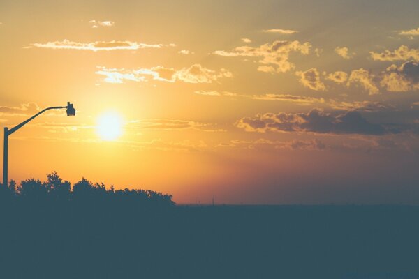 Contrasting sunset on the background of nature