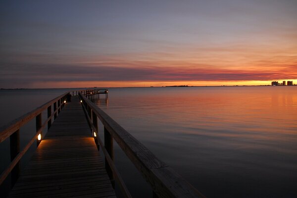 Pier on the water going into the sea