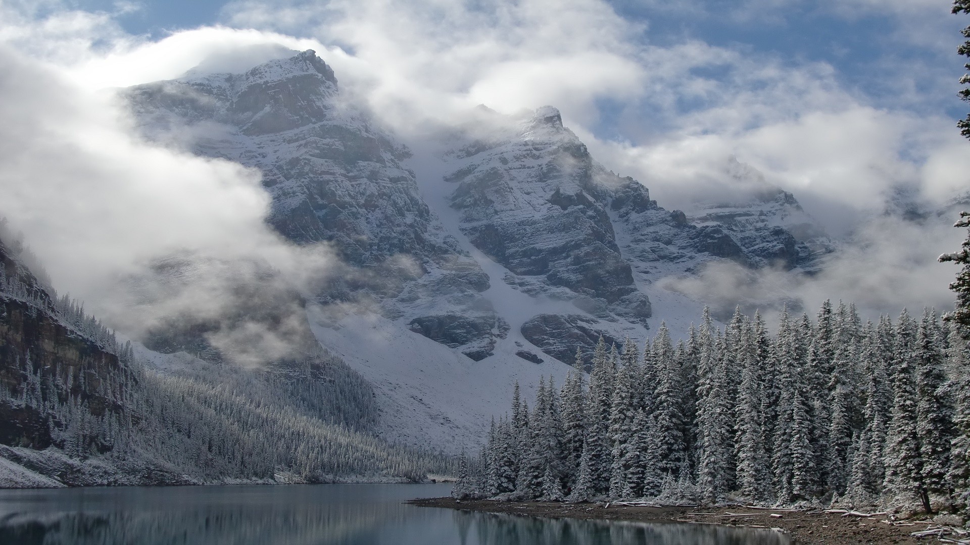 lago nieve montañas paisaje viajes naturaleza cielo hielo escénico invierno al aire libre pico de montaña madera agua frío