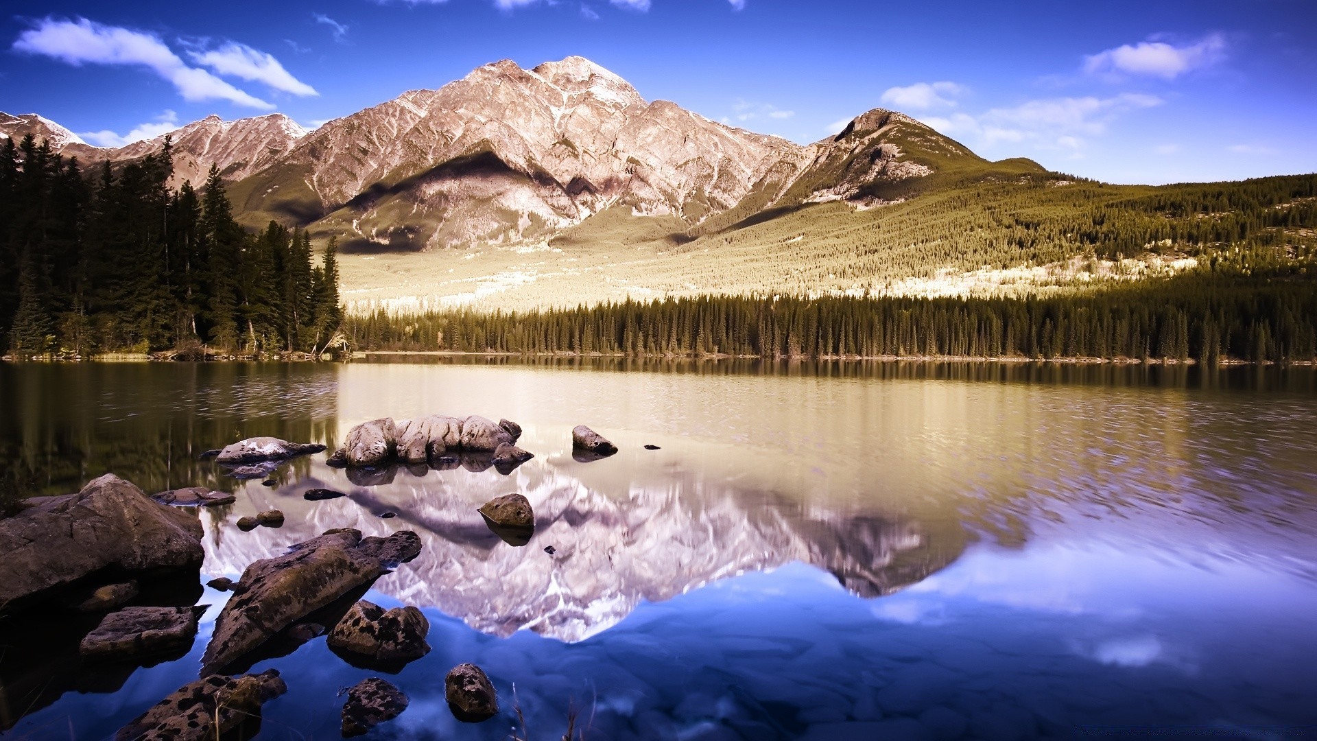 lake mountain water snow landscape travel scenic rock sky reflection outdoors valley nature dawn river daylight