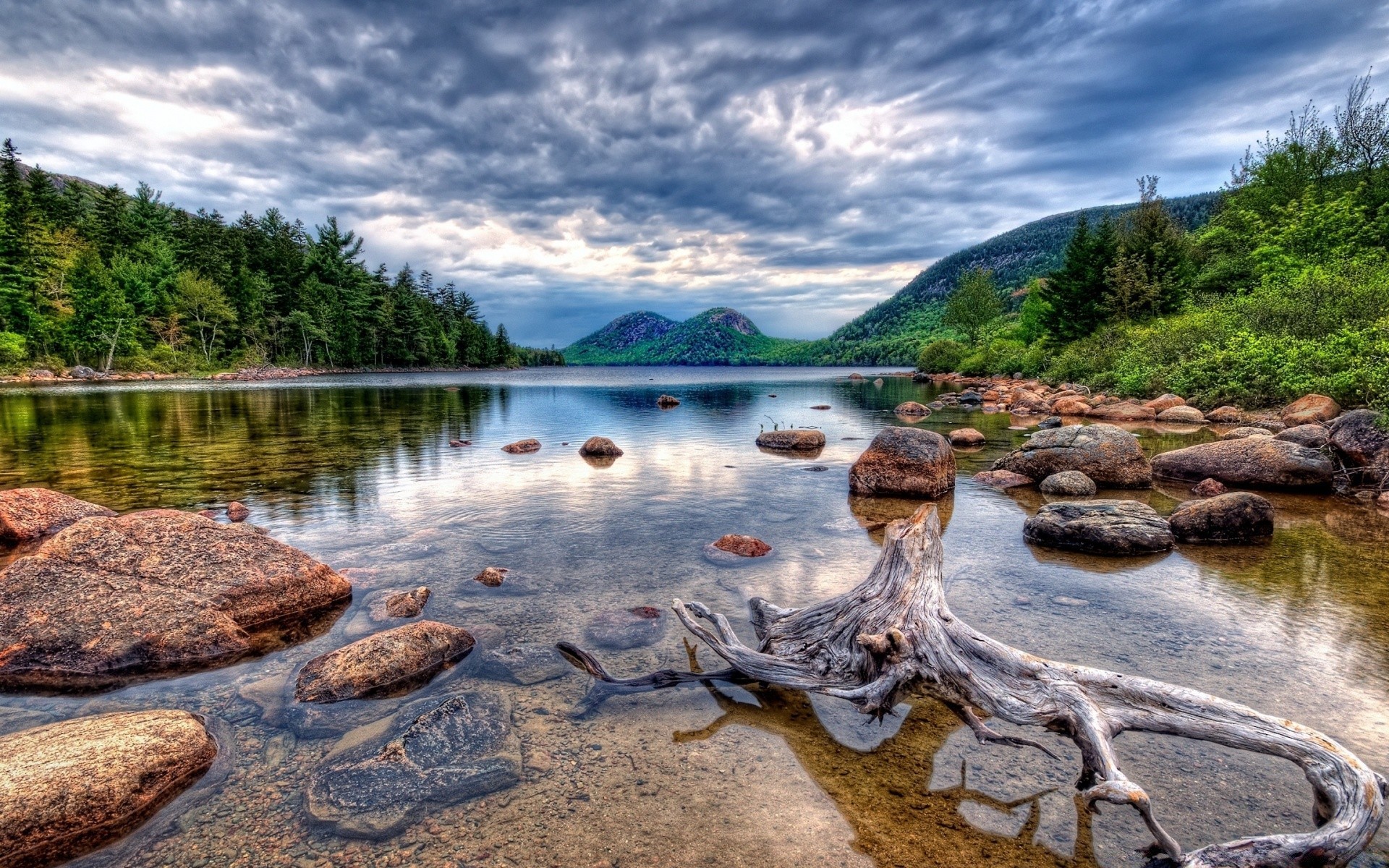 lake water nature travel landscape summer sky rock outdoors river scenic beautiful stone vacation tourism tree tropical reflection