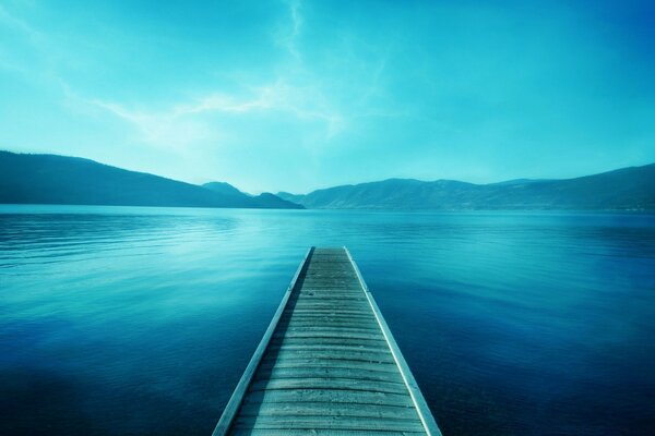 A bridge on the water going into it