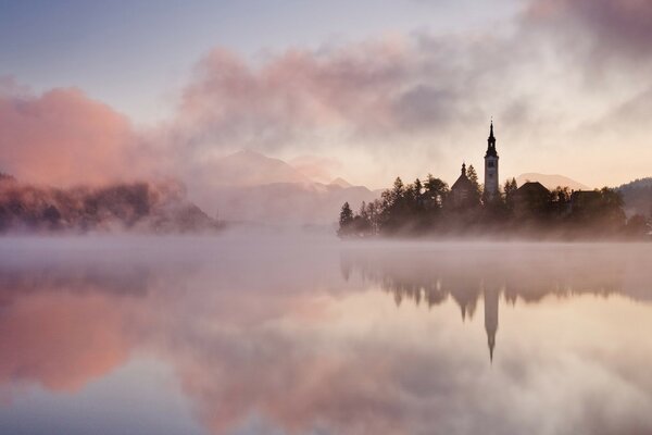 Castle in the fog. An island in the fog. Fabulous landscape