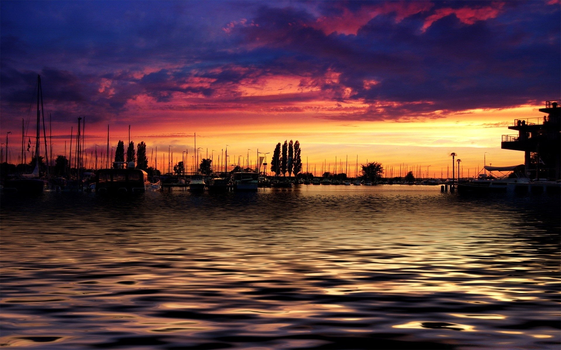 the sky sunset water dawn dusk pier evening boat travel sky bridge sea harbor city reflection transportation system watercraft river silhouette ocean