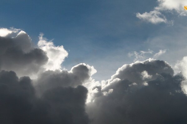 Light breaks through the white clouds