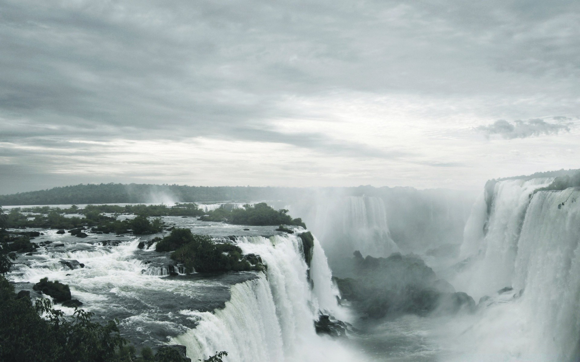 waterfalls water waterfall landscape outdoors fog mist travel nature winter river sky ice rock snow