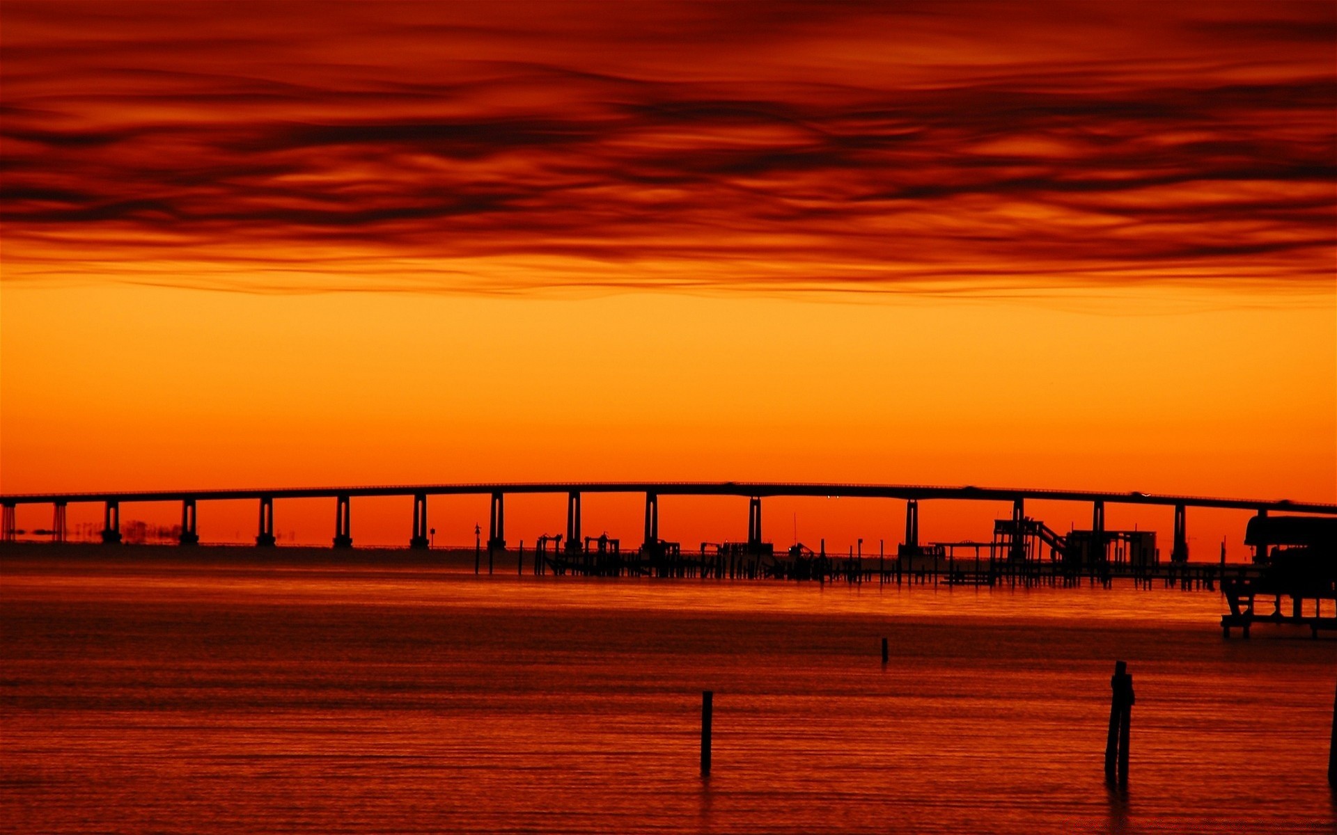 the sky sunset dawn silhouette sea dusk sun sky water evening ocean pier beach bridge nature landscape light