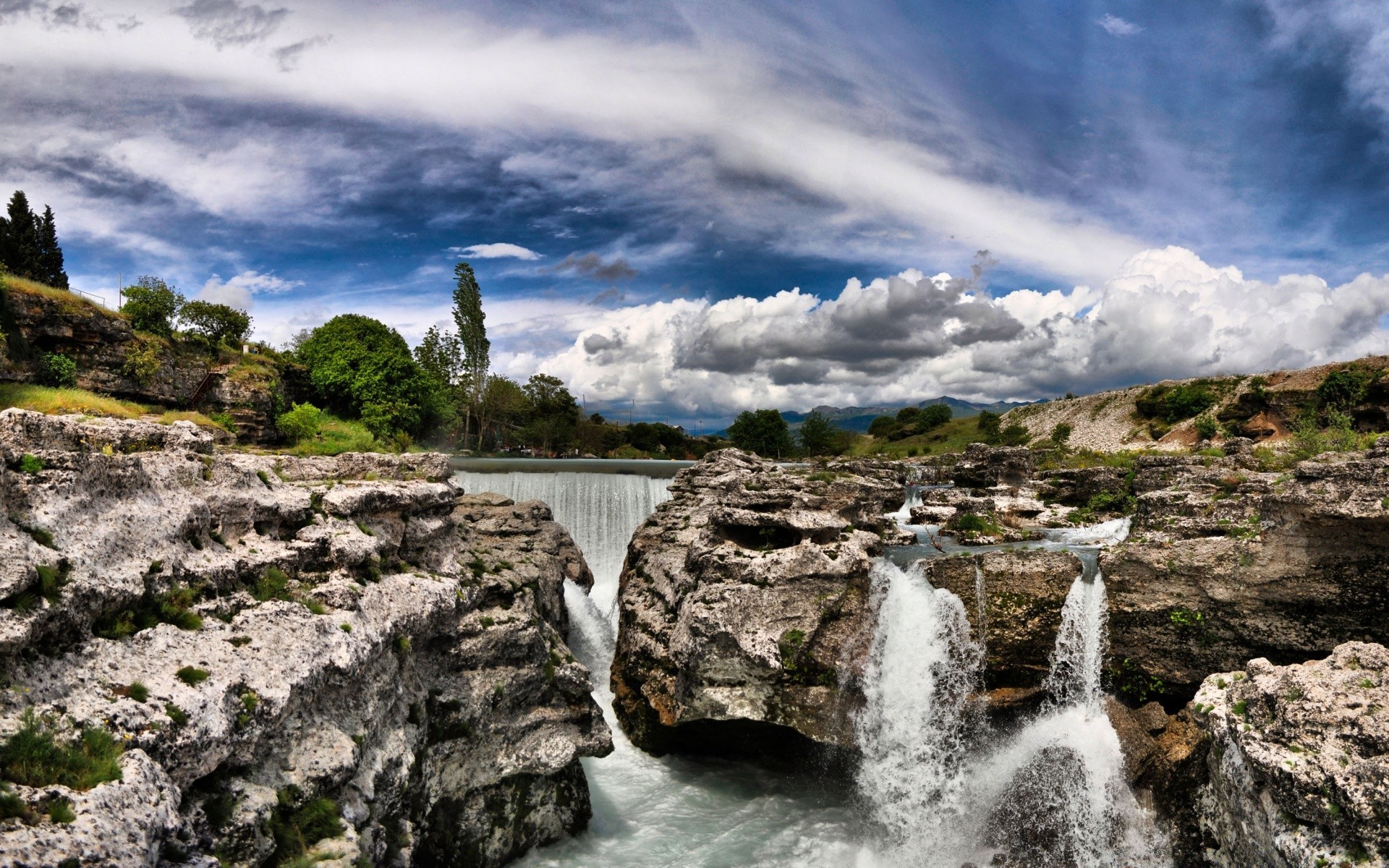 waterfalls water travel landscape sky rock nature outdoors seashore sea scenic stone tourism mountain cloud summer