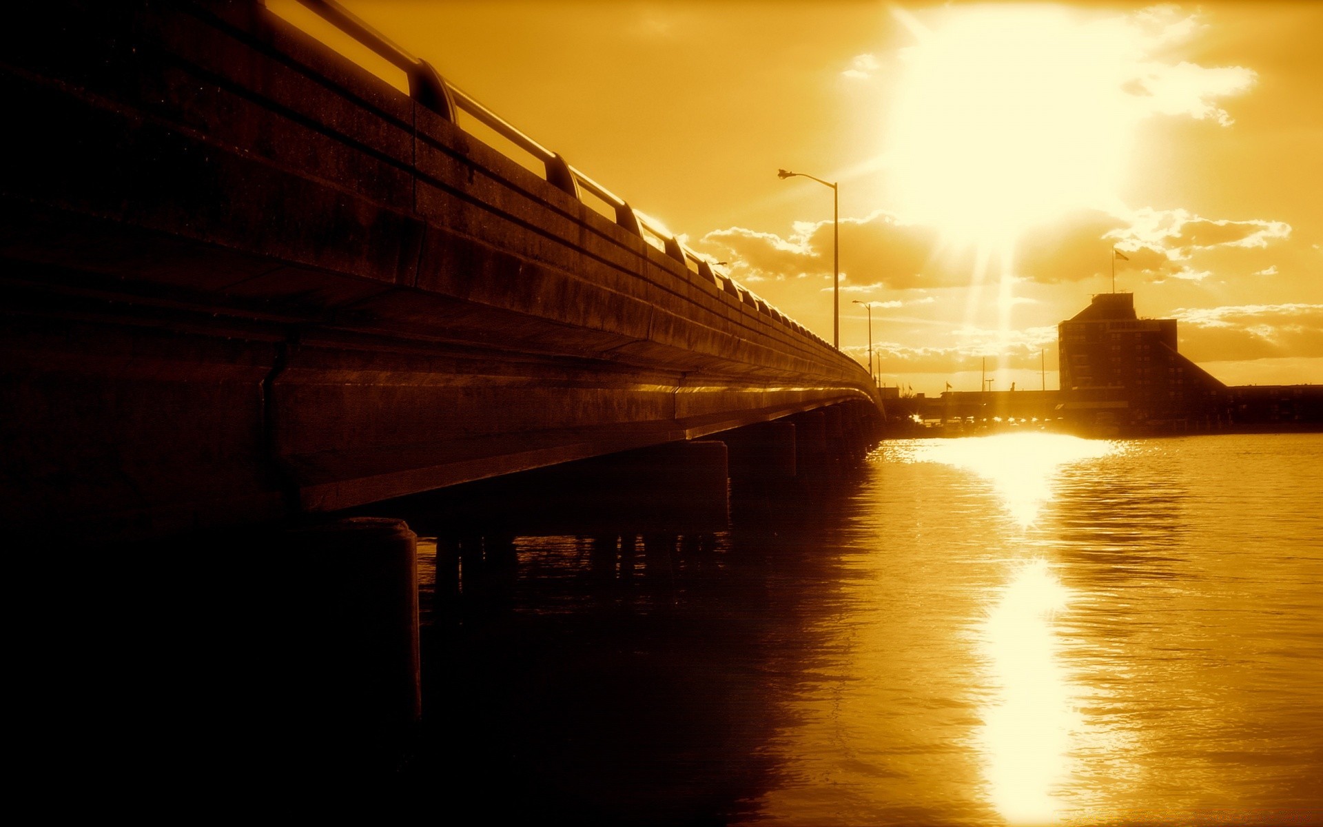 ciel coucher de soleil eau aube soir crépuscule pont lumière soleil voyage plage architecture ciel mer ville océan paysage