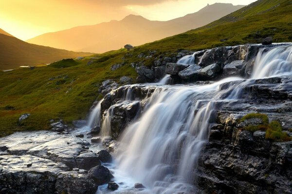 Landscape: beautiful waterfalls at dawn