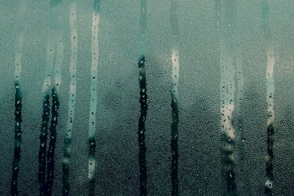 Raindrops on the fogged glass