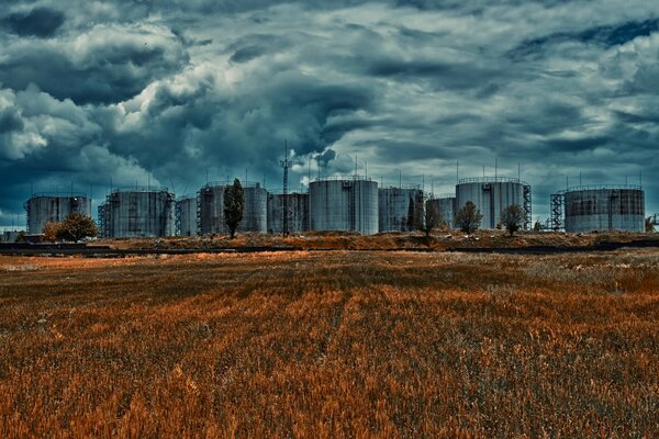 Panorama of the cloudy sky over the silo