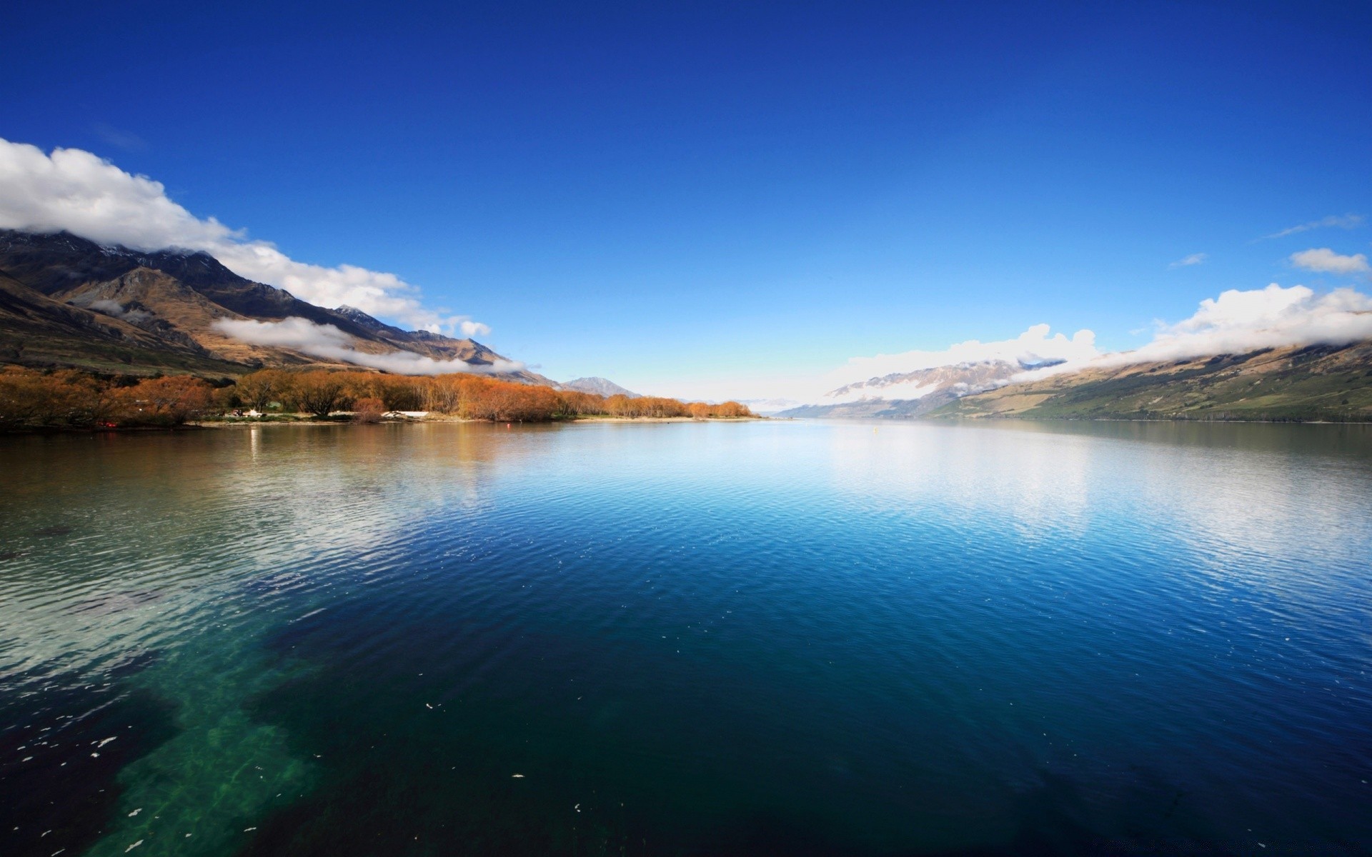 lake water sunset dawn reflection travel landscape sky beach sea nature evening dusk sun seashore mountain outdoors