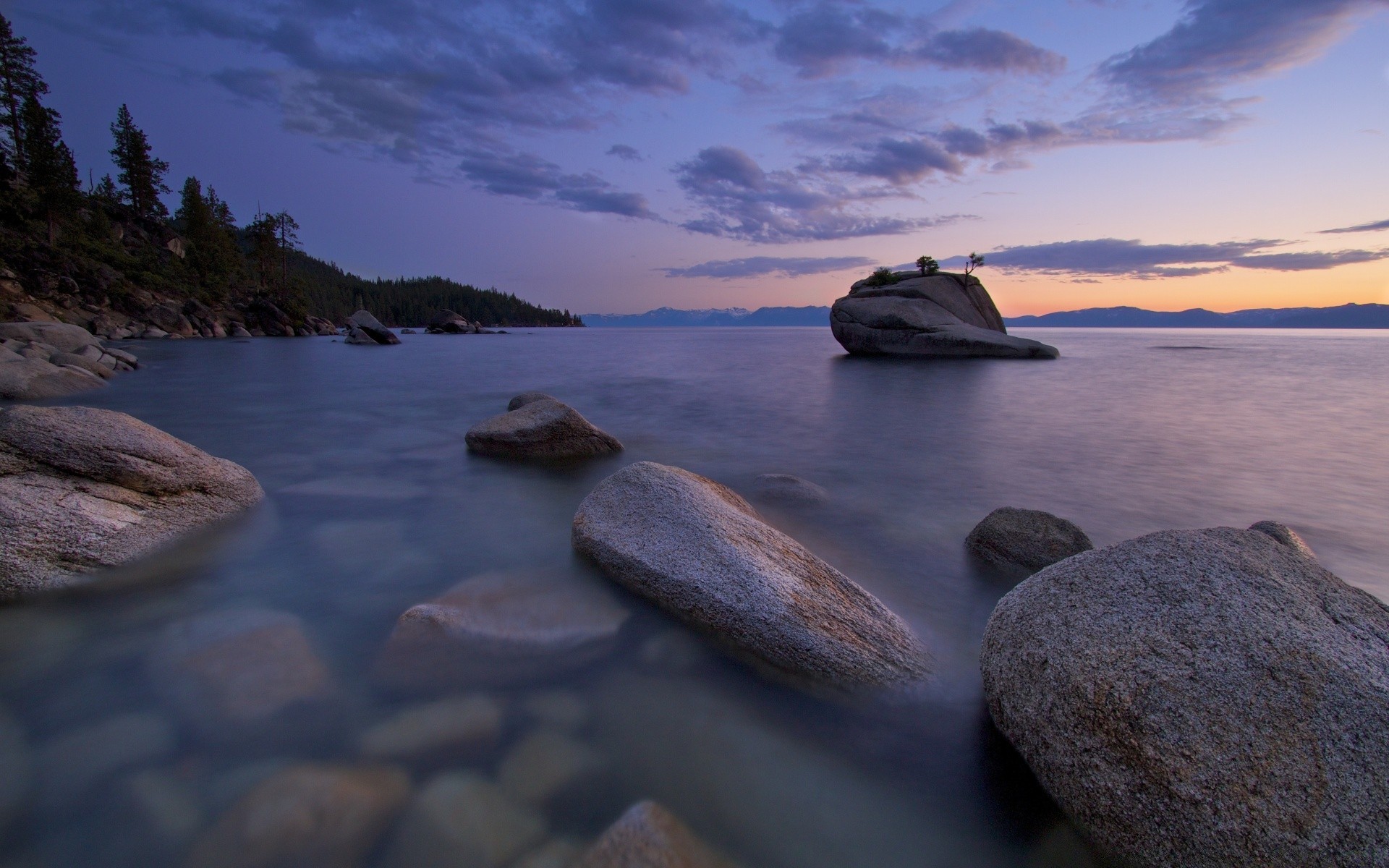 lake water rock sunset beach evening seashore boulder dusk sea landscape composure dawn nature seascape ocean travel sky reflection relaxation