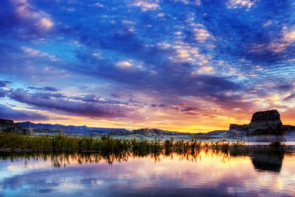 Sunset at the cliff and the surface of the water